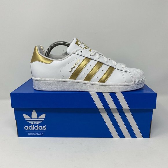 white and gold adidas shell toes